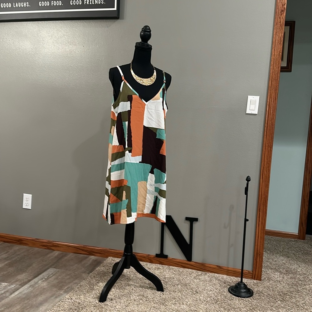 Women’s summer dress above knee.